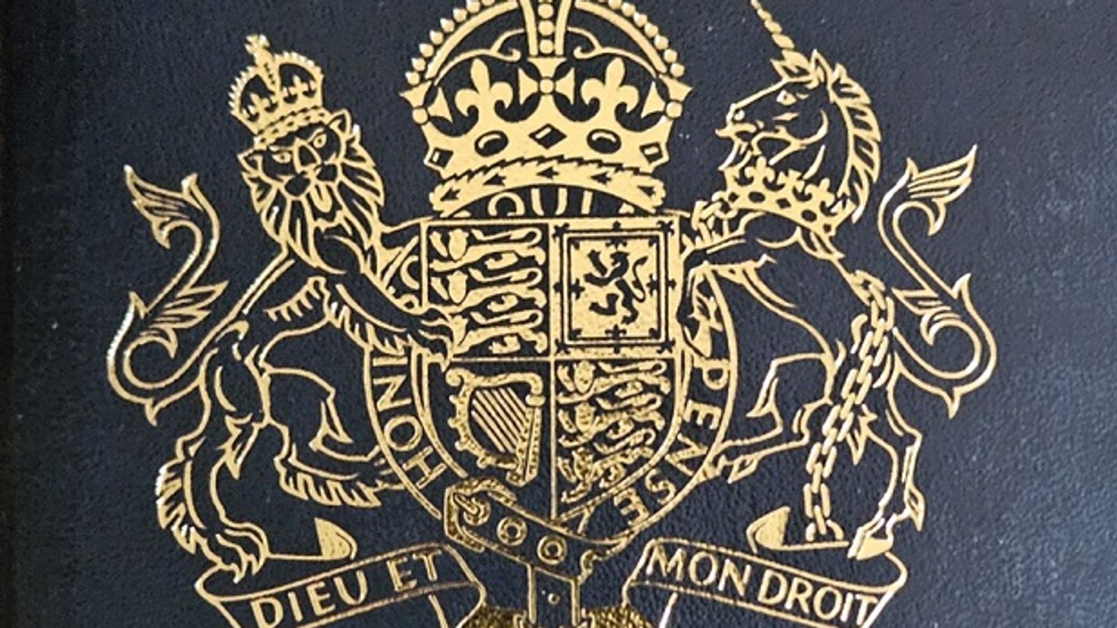 The new British passport cover features the King's Coat of Arms. Pic: PA