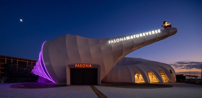 Exterior view of the Pasona Natureverse Pavilion at night