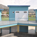 The School of Social Development / studio berardi miglio - Exterior Photography, Fence, Windows, Facade, Stairs, Handrail, Deck, Balcony