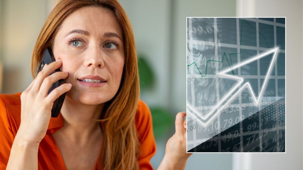 Woman on phone and interest rate rise
