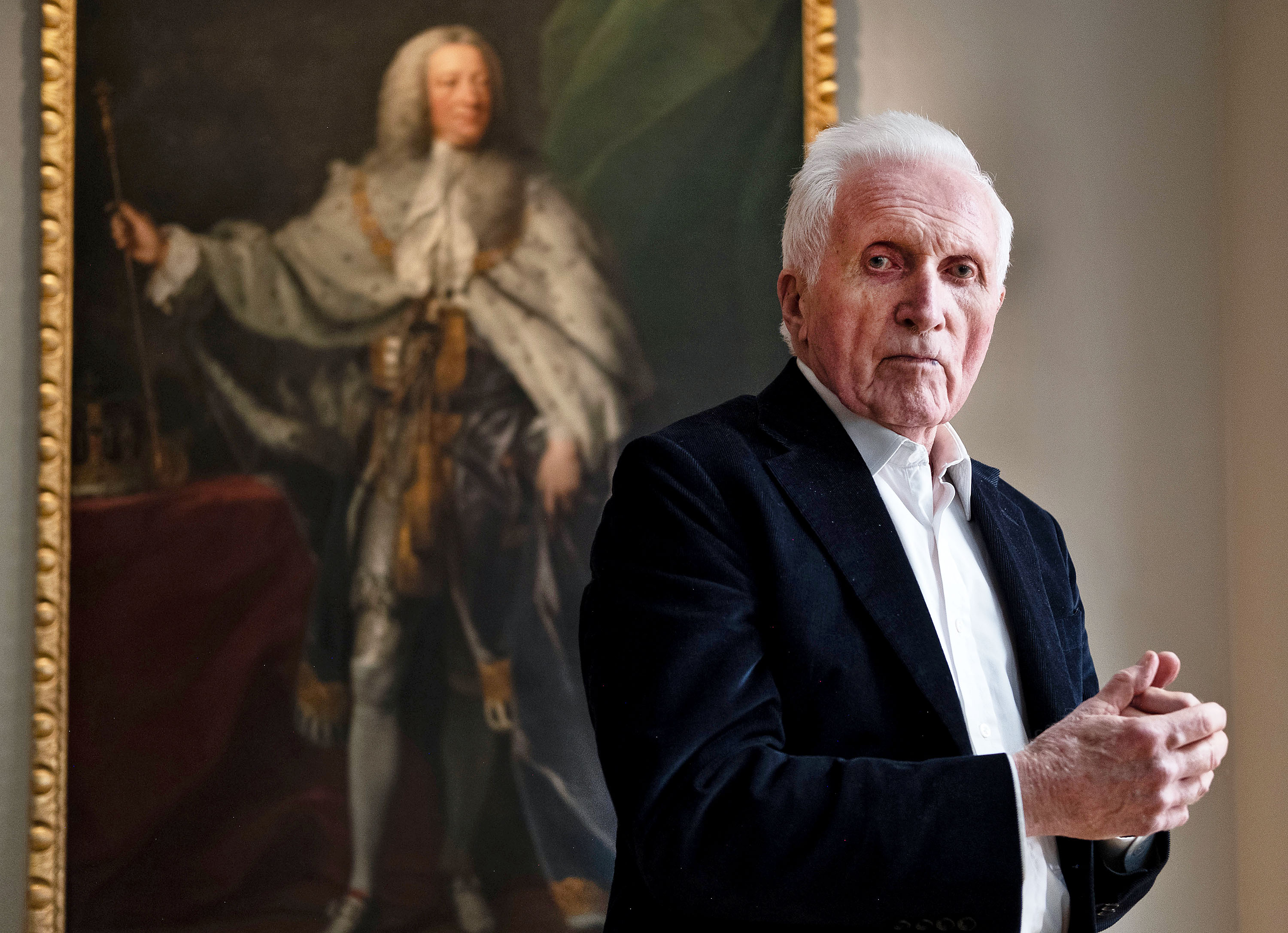 David Dimbleby in front of a painting of George II by John Shackleton.