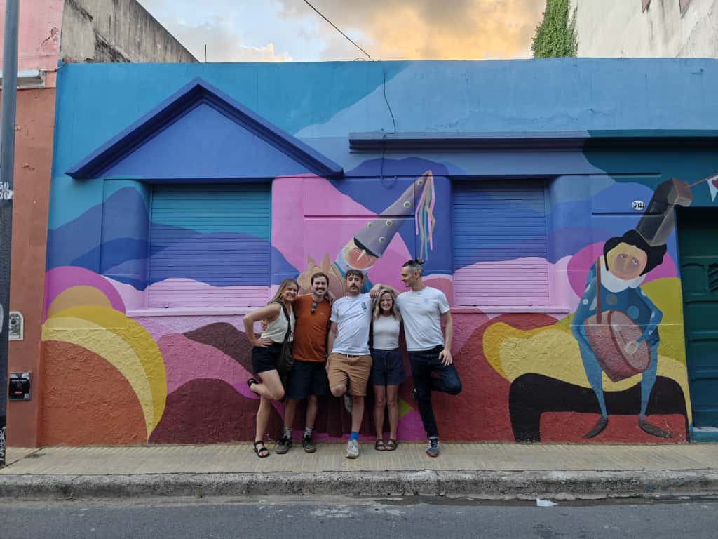 Christian Aldridge, Victoria Bond, and three other hikers pose for a group photo in Buenos Aires, Argentina.