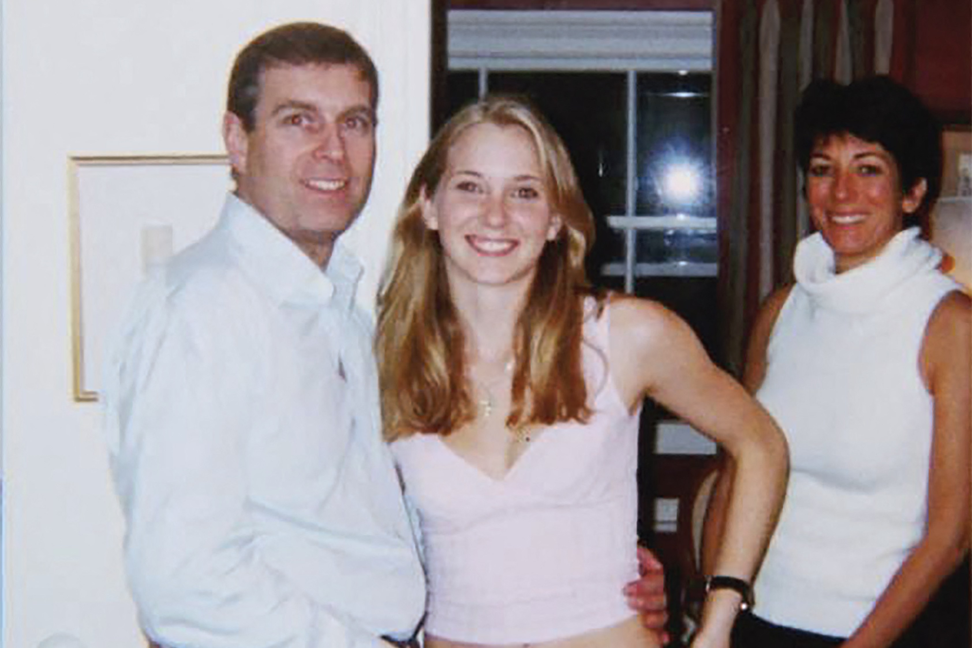 Prince Andrew, Virginia Giuffre, and Ghislaine Maxwell posing for a photo.