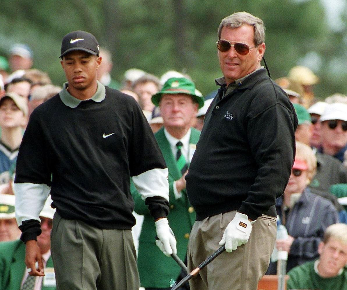 Tiger Woods approaching Fuzzy Zoeller on the first hole of the 1998 Masters.