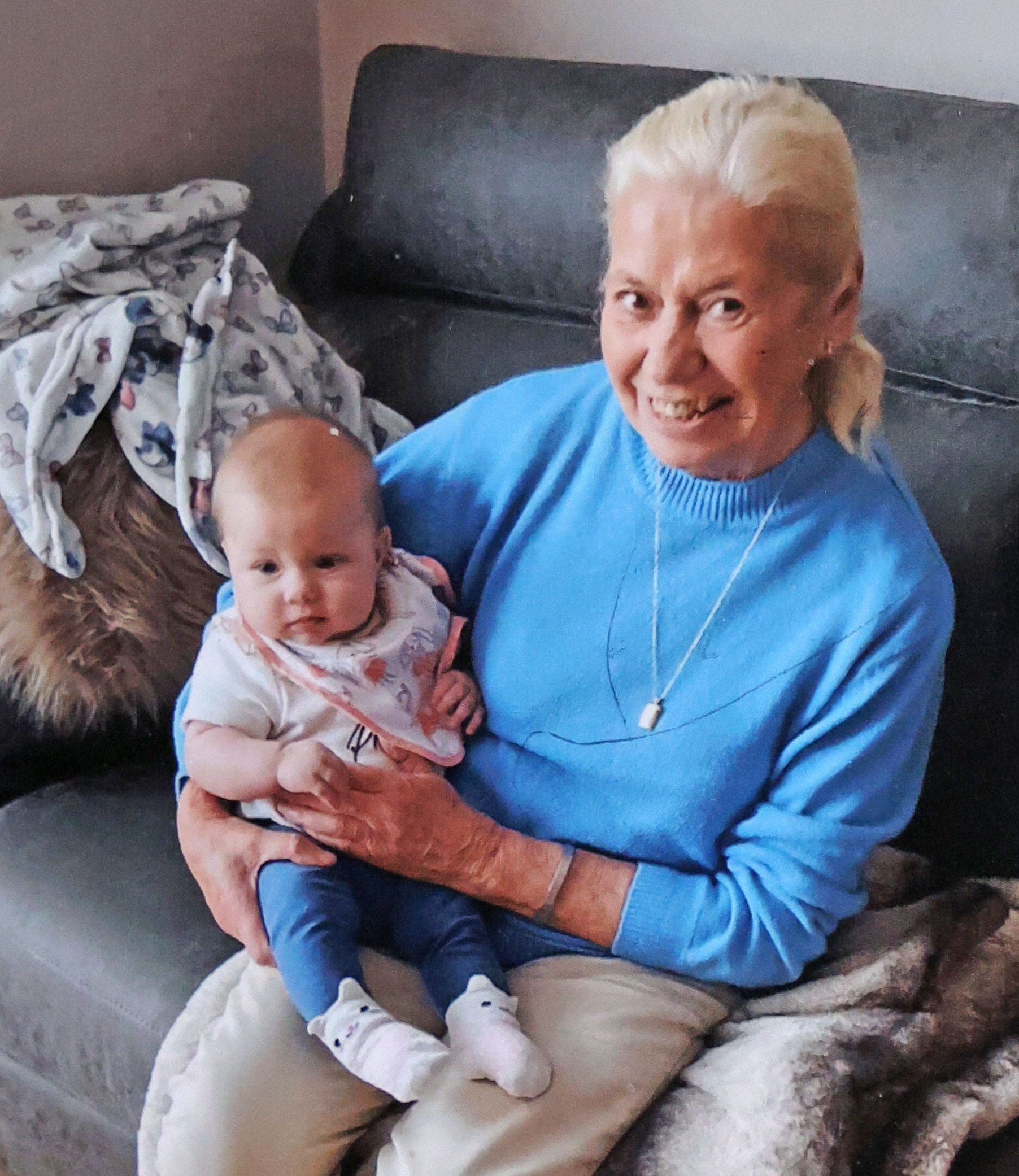 Helen Phillips holding her great-granddaughter.