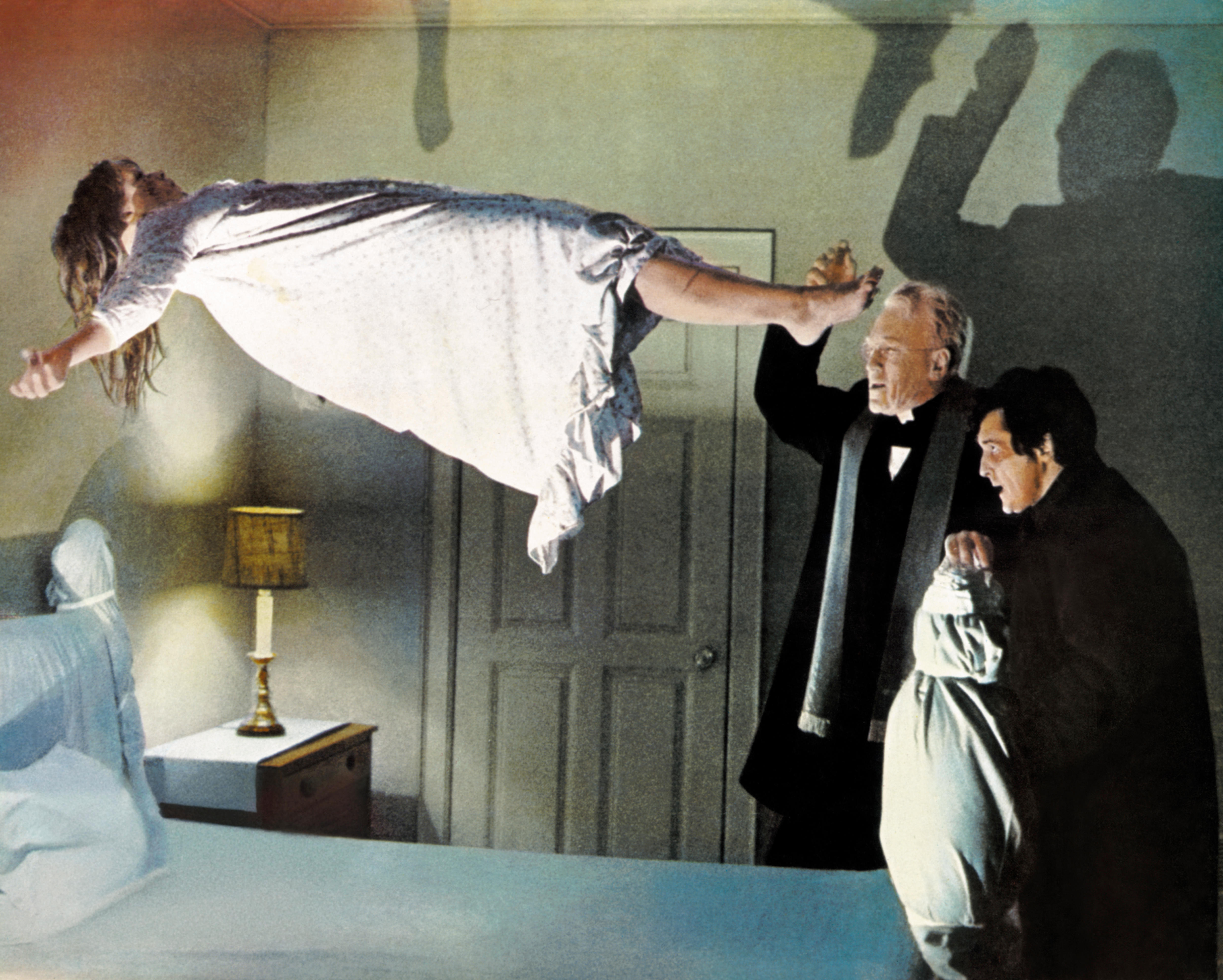 Illustration of Linda Blair levitating with Max Von Sydow and Jason Miller from The Exorcist.
