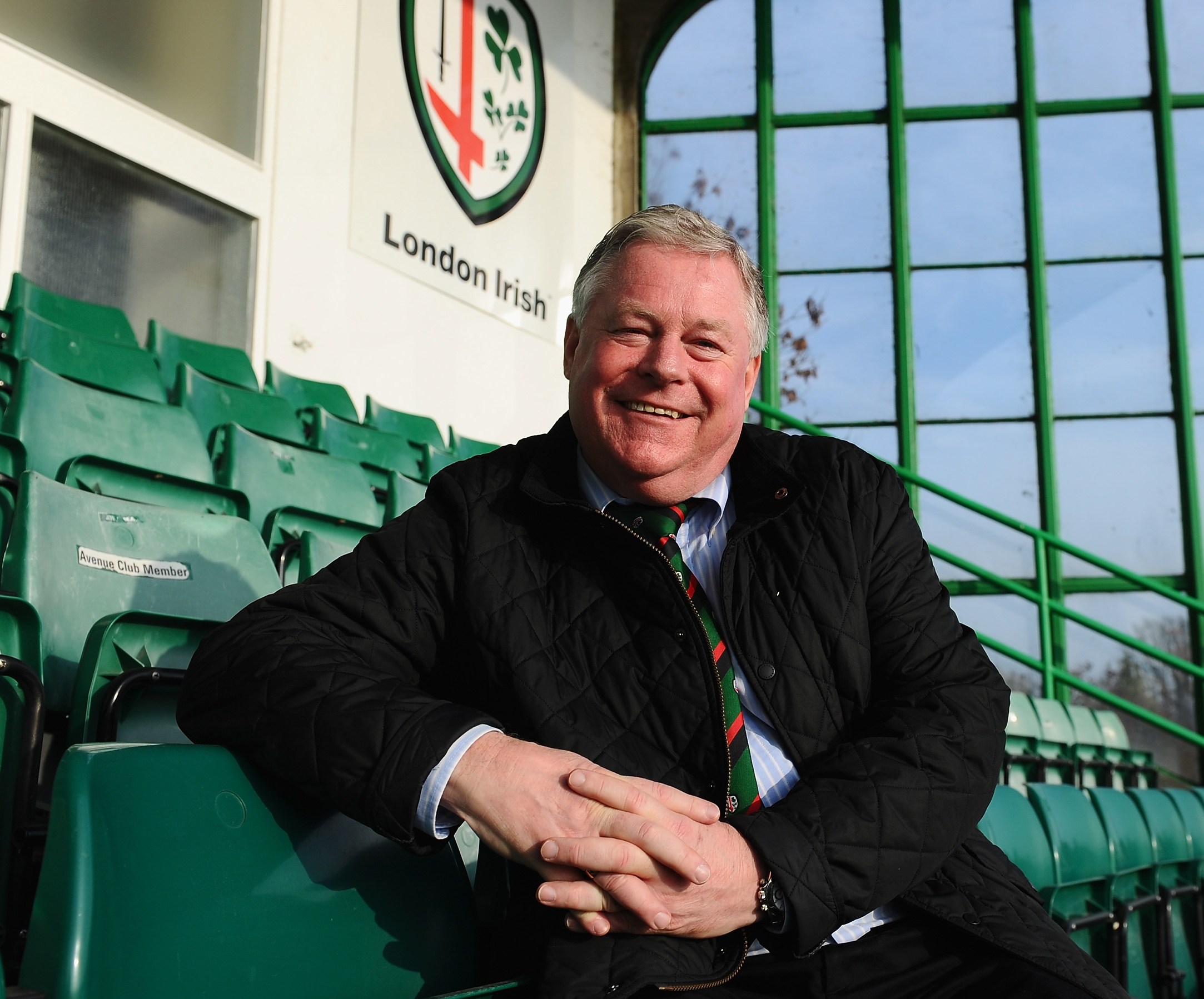 London Irish owner Mick Crossan poses for a photo.