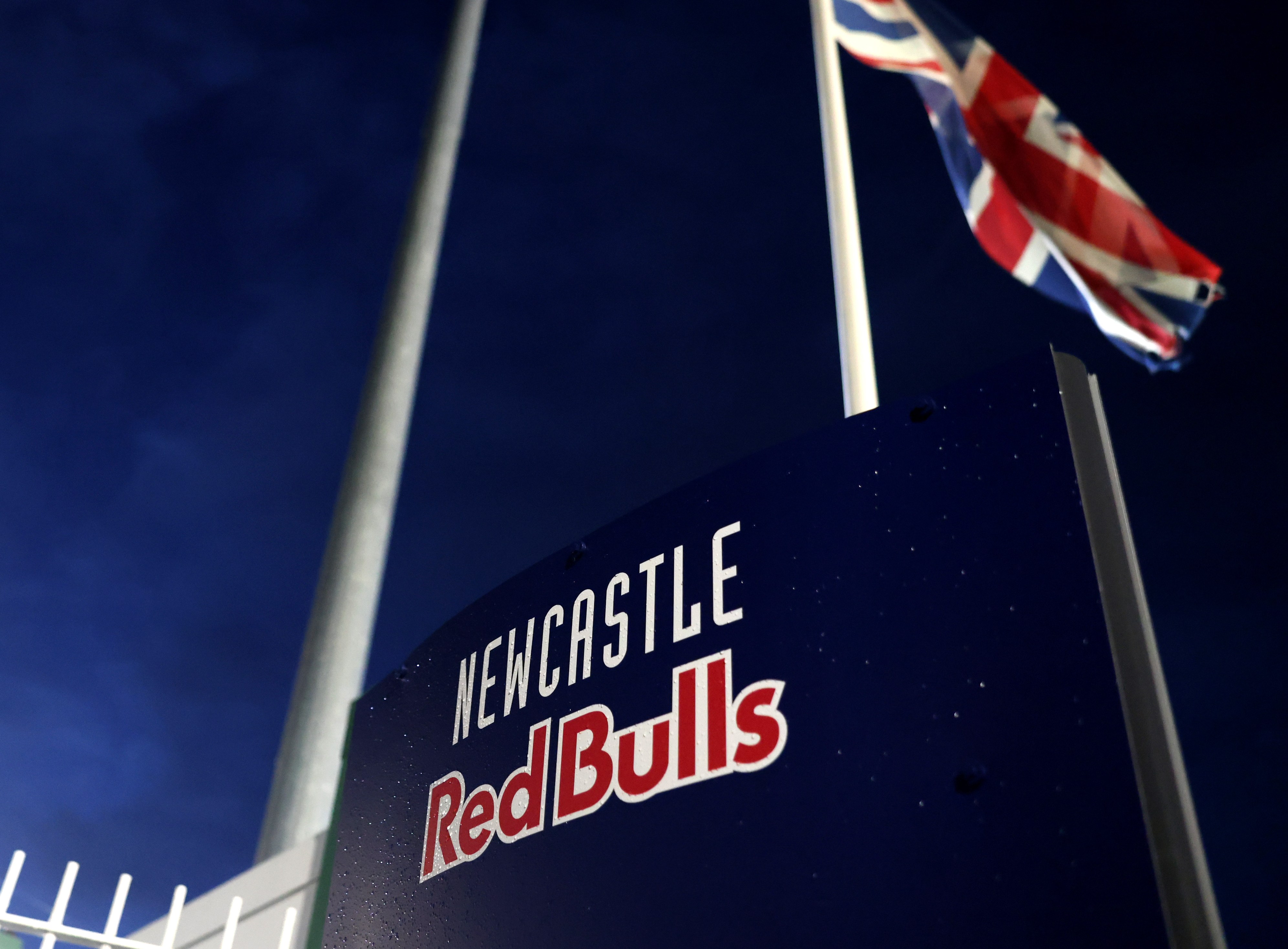 Newcastle Red Bulls branding sign outside the stadium.