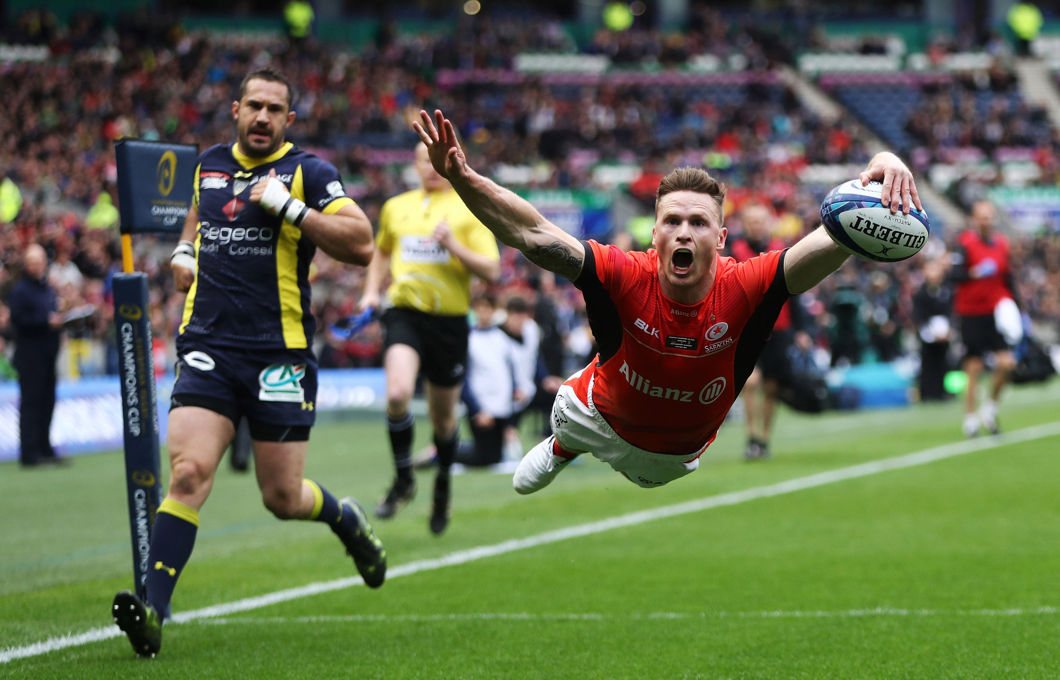 Chris Ashton of Saracens dives over to score a try during the European Rugby Champions Cup Final.