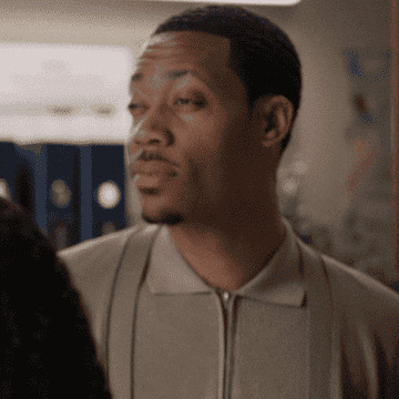 Tyler James Williams looking skeptical in a TV scene