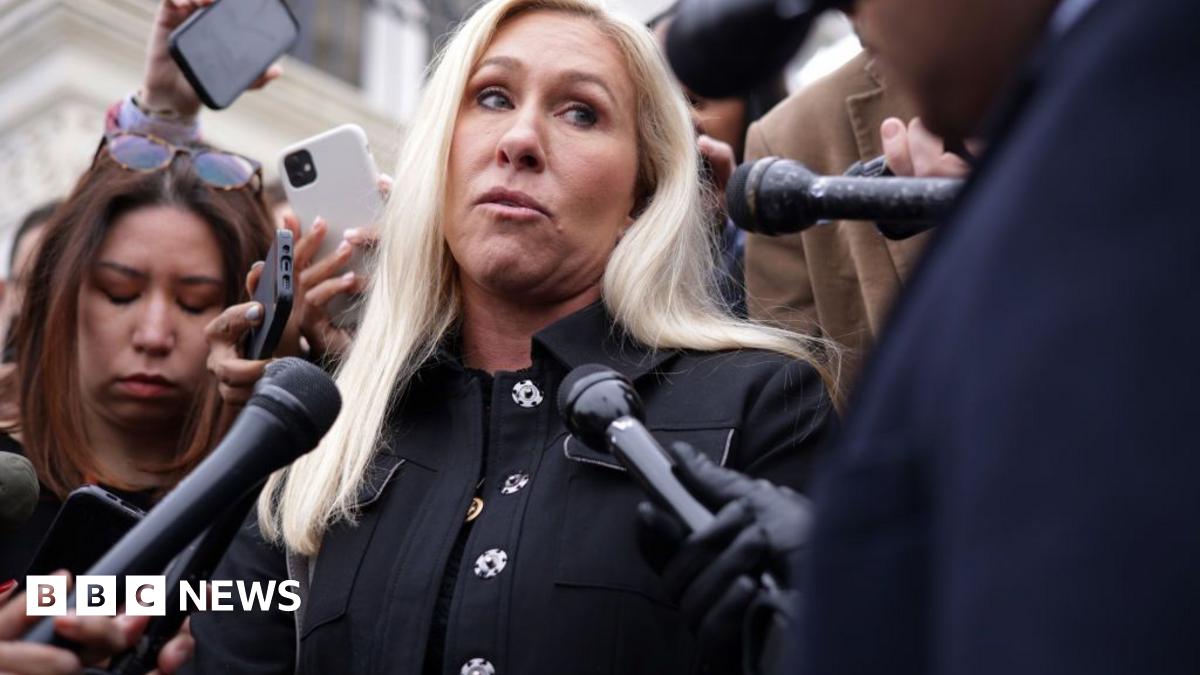 Marjorie Taylor Greene speaks to reporters outside the US Capitol in March