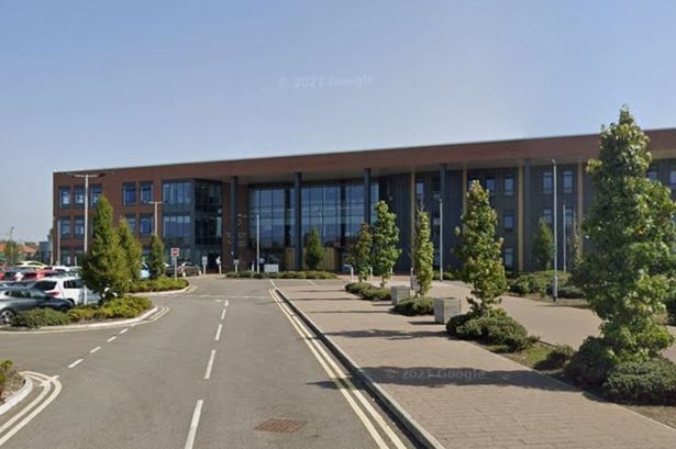 The image shows the school from the street via Google Maps