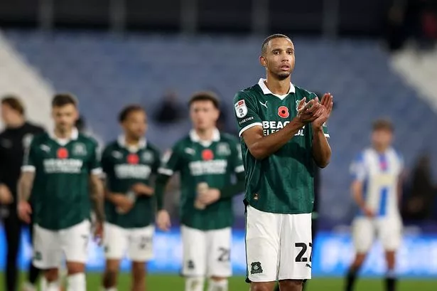 Argyle defender Brendan Galloway applauds the travelling Green Army after the 3-1 League One defeat by Huddersfield Town at Accu Stadium on Saturday, November 8, 2025 (Photo by Isabelle Field/Getty Images)