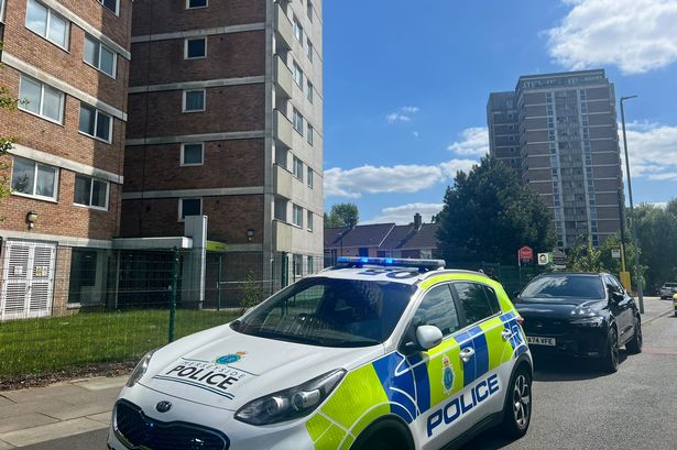 Police outside Beech Rise on Roughwood Drive