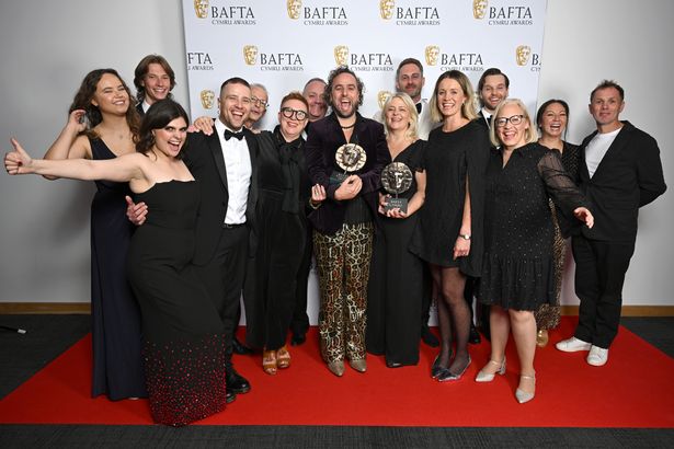 Gwyneth Keyworth, Adam Knopf, James Kent, Rebekah Wray-Rogers, Daf James, Jessica Brown Meek, Libby Durdy, Sion Daniel Young and Danielle Palmer and production team pose with  the Editing Award and the Writer Award for 'Lost Boys and Fairies' in the Winners Room