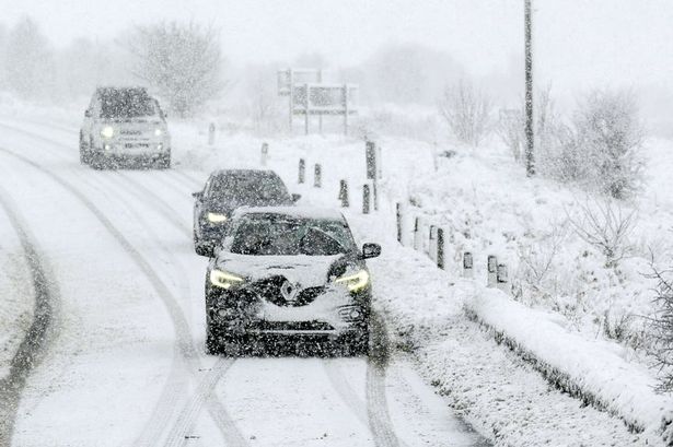 Cars driving through snow on the A169 between Pickering and Whitby on the North Yorkshire Moors (Danny Lawson/PA)