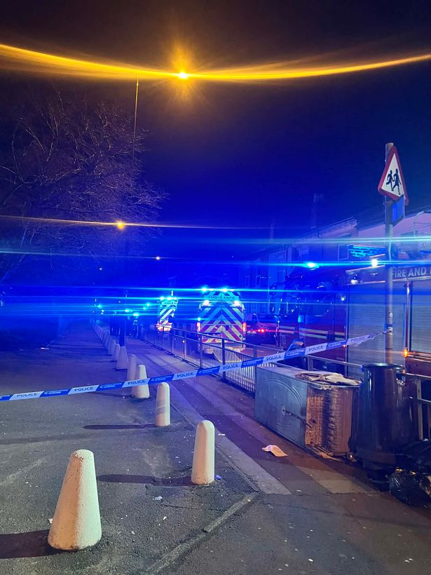 Police, ambulance and fire crews (with ambulances and a fire engine with blue lights flashing pictured) were called to Muntz Street in Small Heath in what was first thought to be a 'hazmat incident' but police confirmed it was an 'egg and flour flght'  