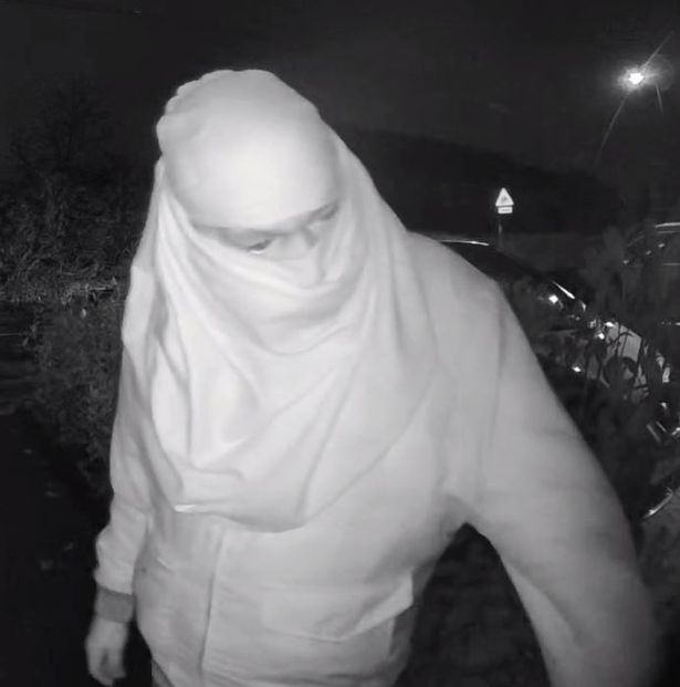 CCTV footage of man outside house in early hours of morning.
