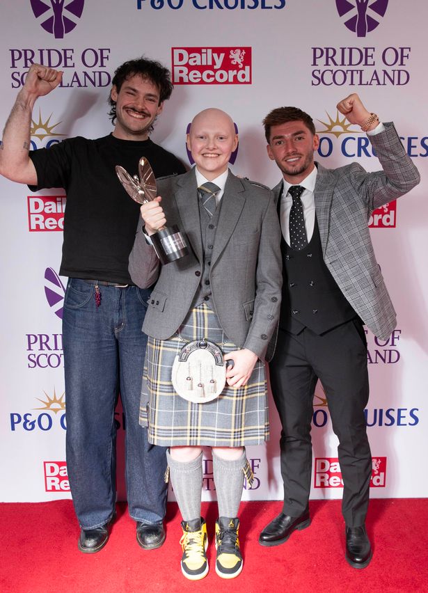 Georgie with award presenters James Marriott and Billy Gilmour