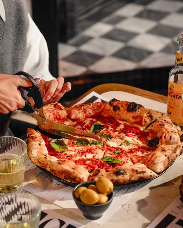 Forbici's pizzas are often served with scissors in a nod to Neapolitan heritage