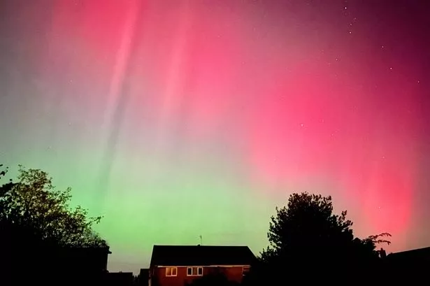 Wide angle view of the aurora borealis northern lights making a rare appearance in the UK