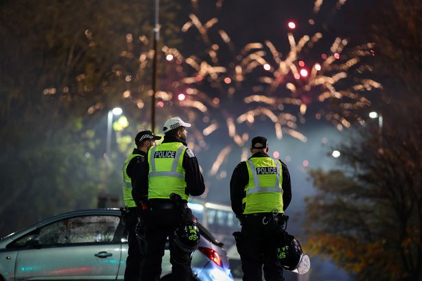 Police officers in Edinburgh on Bonfire Night