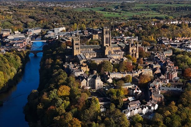 Autumn colours surround Durham Cathedral as the River Wear flows past.