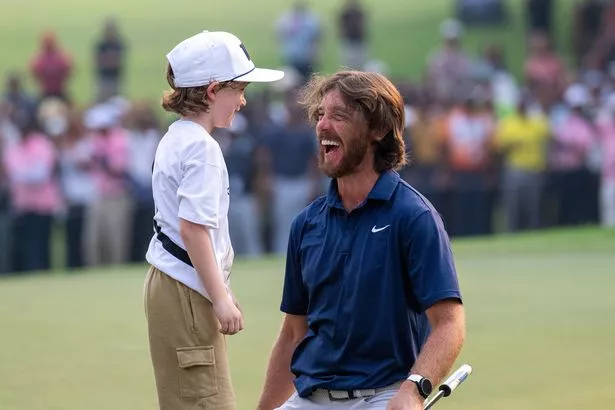 Tommy Fleetwood and his son