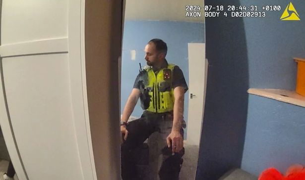 A GMP officer in Davies' bedroom