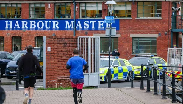 Police and underwater search units at Bristol's harbourside
