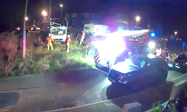 GMFRS attending a van fire at the green. 