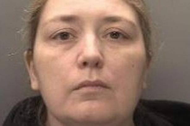 Cathleen is white, around 5 ft 8 ins tall and has long blonde hair