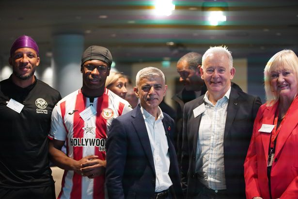 Sir Sadiq Khan with young people at a scheme in London
