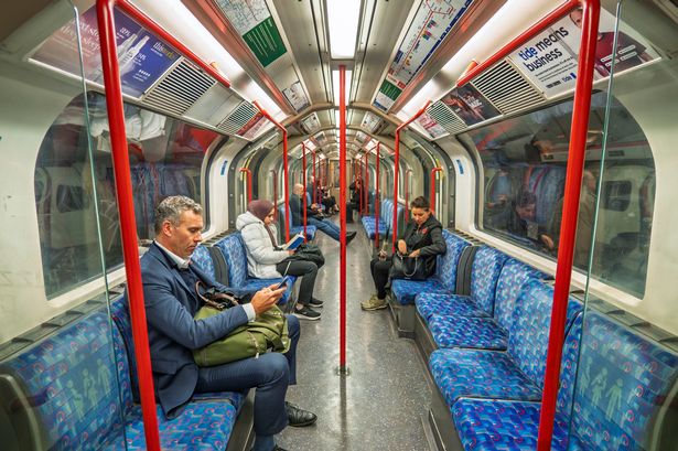 People travelling on a London Underground train, UK. (Photo by: Alex Segre/UCG/Universal Images Group via Getty Images)