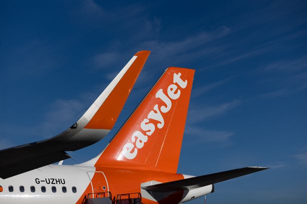 The tailfin of an EasyJet Plc passenger aircraft at London Southend Airport, in Southend-on-Sea, UK, on Monday, March 31, 2025. The carrier plans to base three aircraft at Southend and operate seven package holiday destinations from there. Photographer: Chris Ratcliffe/Bloomberg via Getty Images