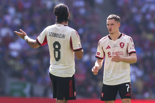 Dominik Szoboszlai and Florian Wirtz of Liverpool during the 2025 FA Community Shield match between Crystal Palace and Liverpool at Wembley Stadium on August 10, 2025 in London, England. 