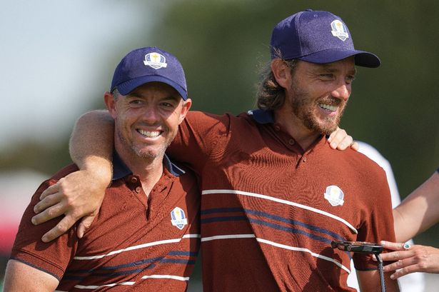 Rory McIlroy and Tommy Fleetwood of Team Europe