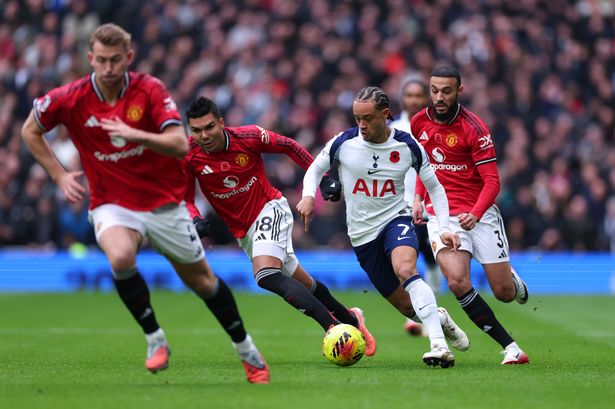 Noussair Mazraoui among the Manchester United players tracking back during the draw with Tottenham