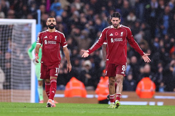A dejected Mohamed Salah and Dominik Szoboszlai during Liverpool's defeat to Manchester City