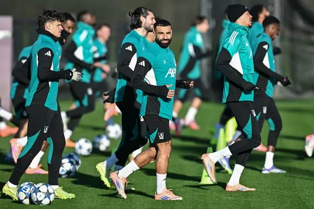 Liverpool's Egyptian striker #11 Mohamed Salah (C) attends a training session at the team's training ground in Kirkby, north Liverpool in north-west England, on November 25, 2025, on the eve of their UEFA Champions League league phase football match against PSV Eindhoven.  (Photo by Paul ELLIS / AFP via Getty Images)
