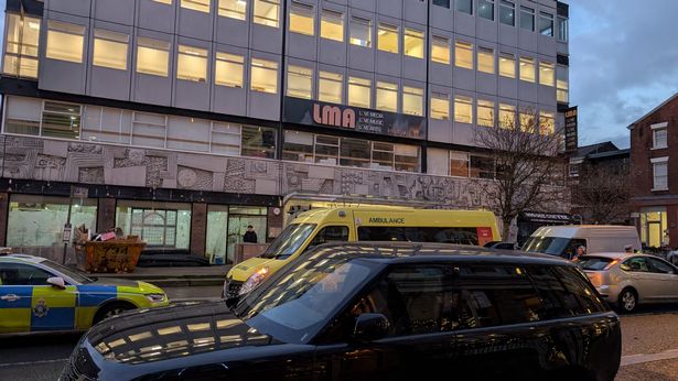 Two ambulances are at the scene