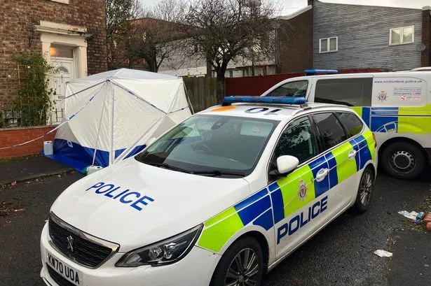 Police and a forensics tent outside a property in Elswick with an attempted murder investigation ongoing
