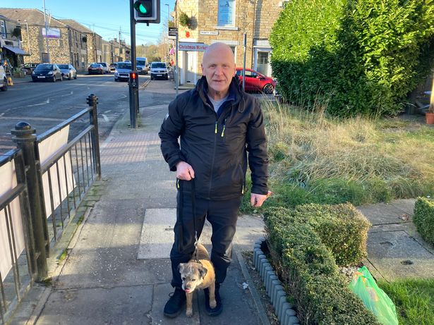 Michael McNamara, 62, with his pooch Scout 