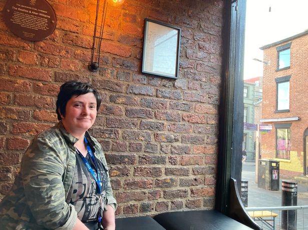 Jacaranda co-owner Cath Nixon with a scan of the letter.