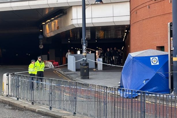 Police officers at the scene of where a woman was fatally stabbed in Birmingham city centre