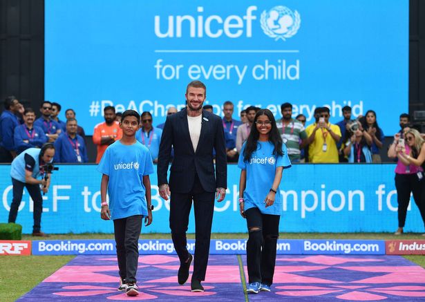 UNICEF Goodwill Ambassadors David Beckham walks out with UNICEF mascots prior to the ICC Men's Cricket World Cup India 2023 Semi Final match