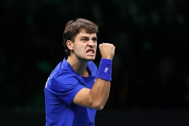 Flavio Cobolli celebrates a break of serve against Jaume Munar during the Davis Cup Final match between Italy and Spain. 