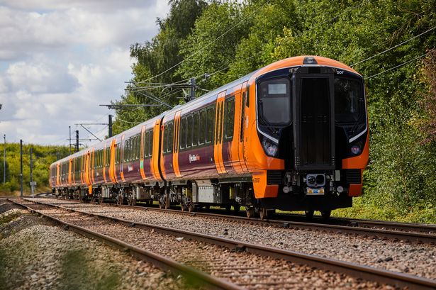 A West Midlands Railway Class 730 train on a railway line 