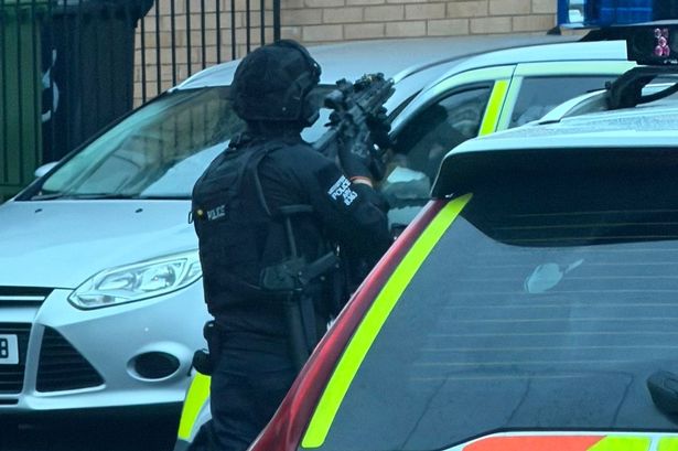 Armed police on Brougham Avenue in Tranmere