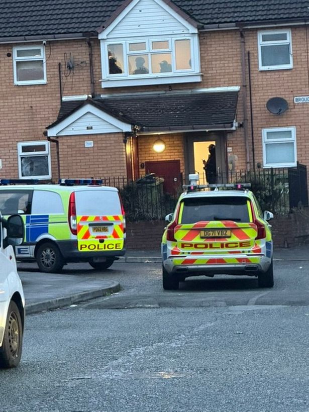 Armed police on Brougham Avenue in Tranmere